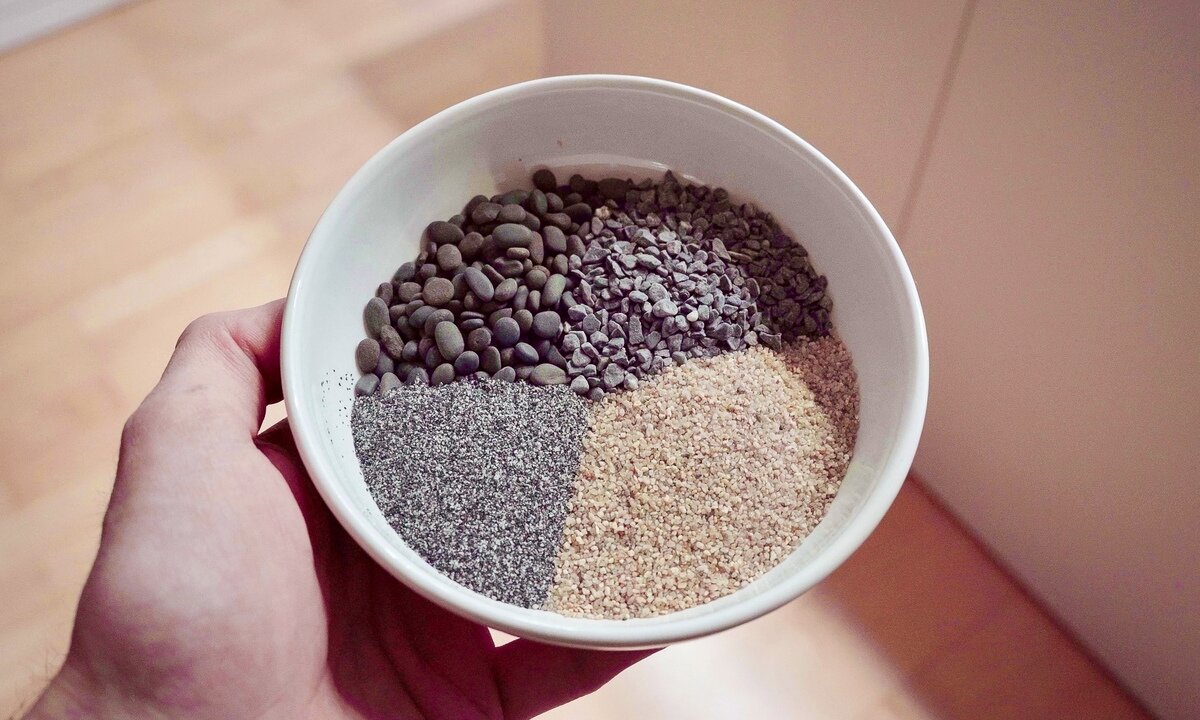 Vergleich verschiedener Bodengründe fürs Aquarium wie Sand und Kies